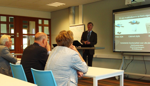 ministers listening intently to Henk de Groot